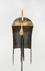 A gold and silver-overlaid steel helmet (kulah khud) with grape vines, Persia, Qajar, 19th century. Accompanie's Sara Angel's article 