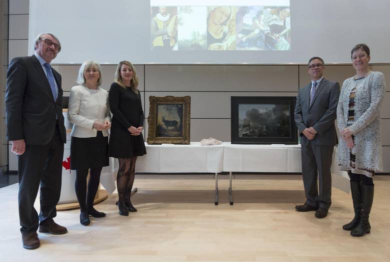 From left: Guenter Stock, president of German Friends of Hebrew University; Marie Gervais-Vidricaire, Canada’s ambassador to Germany; Heritage Minister Mélanie Joly, Clarence Epstein of the Stern Restitution Project and Susanne Anna a museum director mark the recovery of two paintings on Monday in Berlin. With Ships in Distress on a Stormy Sea by Jan Porcellis and Landscape with Goats by Willem Buytewech the Younger.