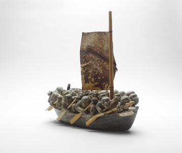 Joe Talirunili, Migration grey stone, wood, hide, thread Overall: 35 x 29.9 x 32 cm (13 3/4 x 11 3/4 x 12 5/8 in.) Art Gallery of Ontario. Gift from the Dr. Michael Braudo Collection, 1993