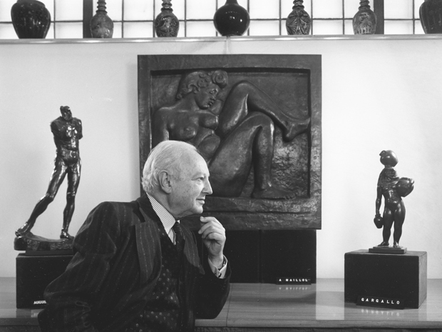 Art collector and philanthropist Max Stern photographed by Yusuf Karsh in his office with Rodin, Gargallo, and Maillol sculptures.